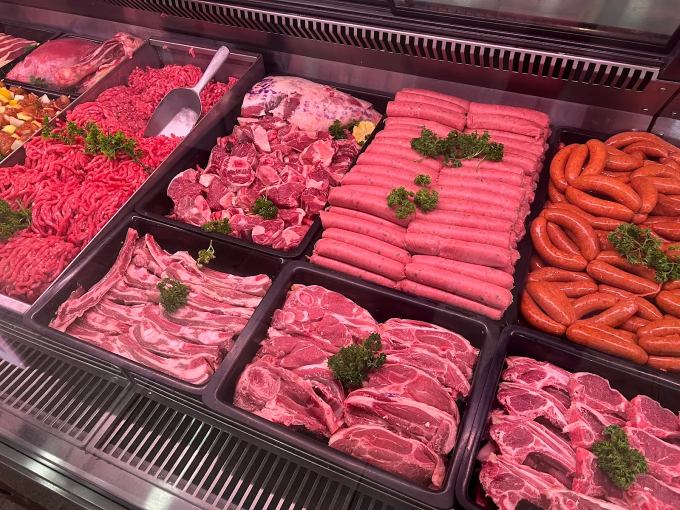 Fresh halaal meat, sausages and chops in the Tops display counter